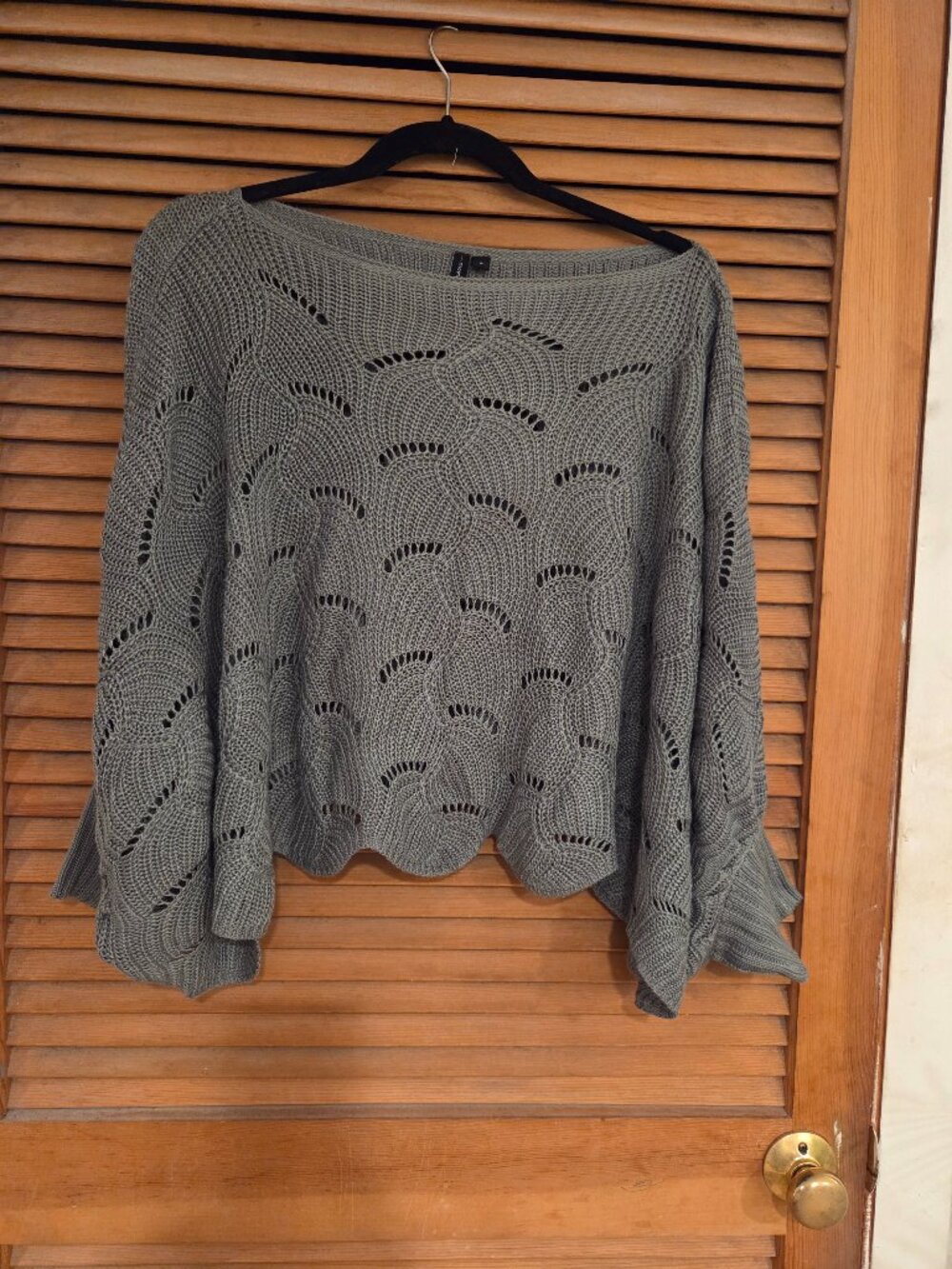 Green knit poncho